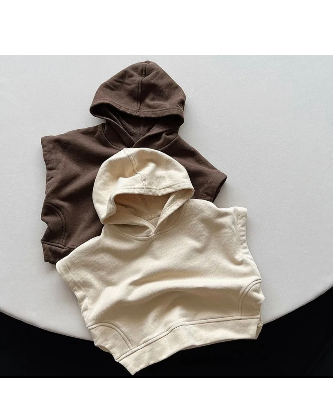 Apricot sleeveless hooded sweatshirt