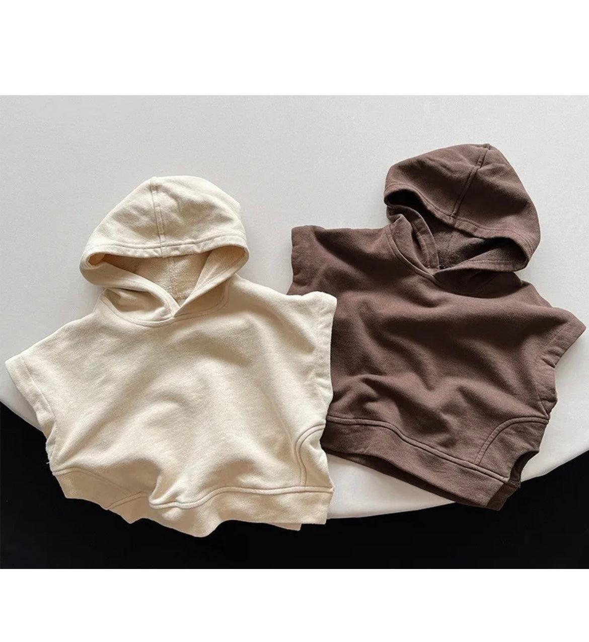 Apricot sleeveless hooded sweatshirt